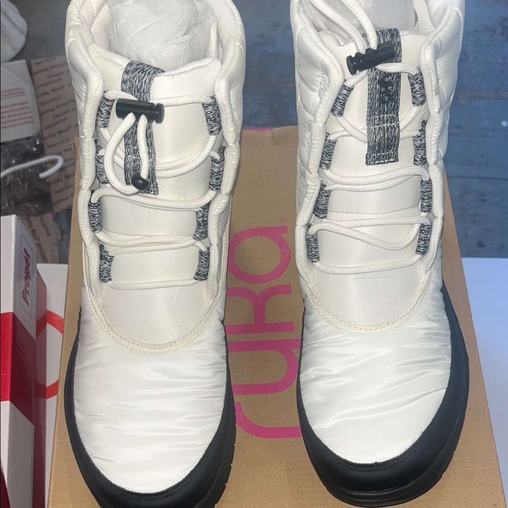 Brand new Ryka White and Black Winter Boots